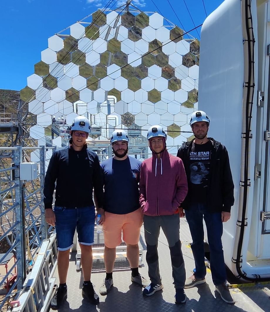 The LST P056 shift crew, in front of the LST-1 mirror and next to the camera of the telescope. From left to right: Franjo Podobnik (operator), Sami Caroff (deputy), Juan Escudero (shift leader) and Claudio Gasbarra (operator).